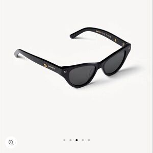 New Machete Suzy Sunglasses, black. Never worn, with box and case. Retails $155.